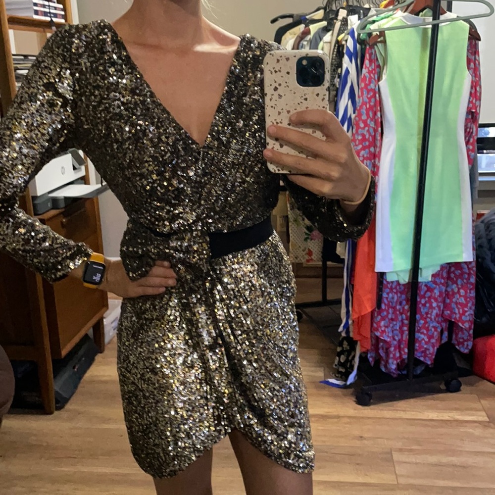 Sequin dress with bow detail and open back